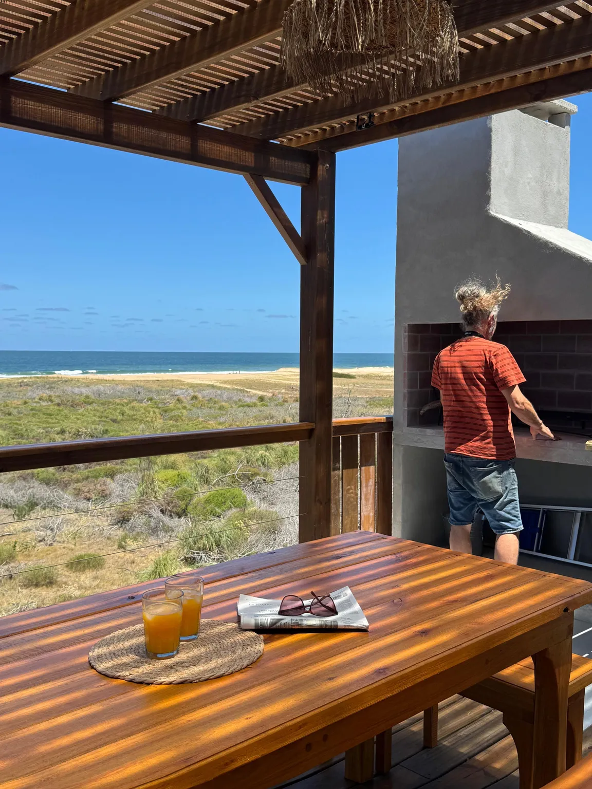 Asado en la terraza frente al mar